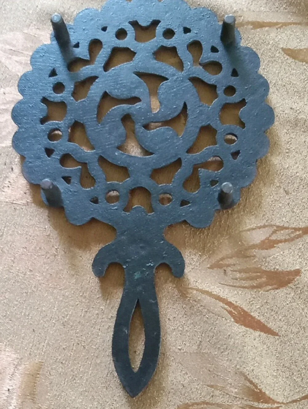 Handcrafted Black rot iron Wall Medallion trivet with feet - Unbranded